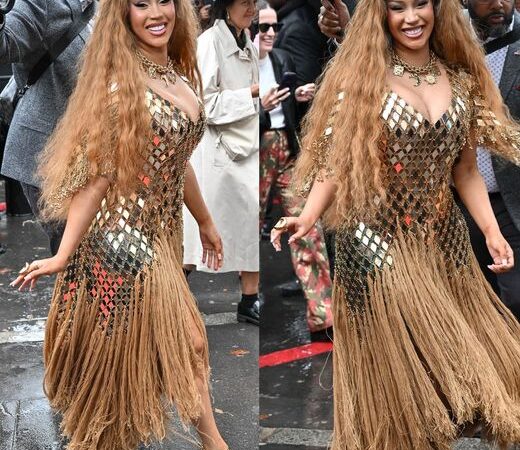 Cardi B goes for gold at Paris Fashion Week in metal and fringe gown