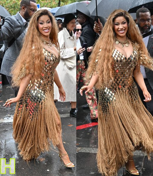 Cardi B goes for gold at Paris Fashion Week in metal and fringe gown