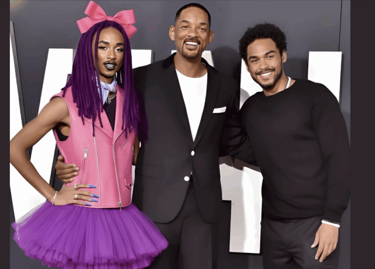 Handsome Jaden Smith strikes a pose with Daddy Will and brother Trey on the red carpet..